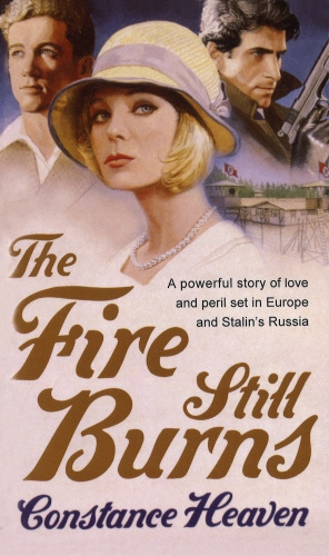 Book cover of The Fire Still Burns by Constance Heaven