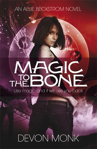 Book cover of Magic to the Bone by Devon Monk