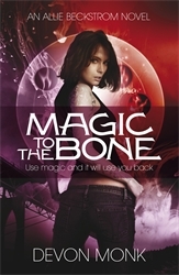Book cover of Magic to the Bone by Devon Monk