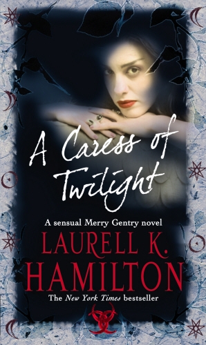 Book cover of A Caress Of Twilight by Laurell K Hamilton