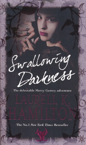 Book cover of Swallowing Darkness by Laurell K Hamilton