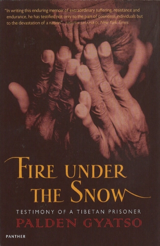 Book cover of Fire Under The Snow by Gyatso Palden