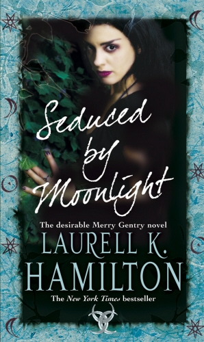 Book cover of Seduced By Moonlight by Laurell K Hamilton