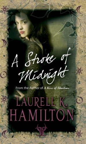 Book cover of A Stroke Of Midnight by Laurell K Hamilton