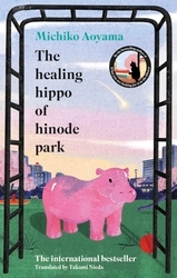 Book cover of The Healing Hippo Of Hinode Park by Michiko Aoyama