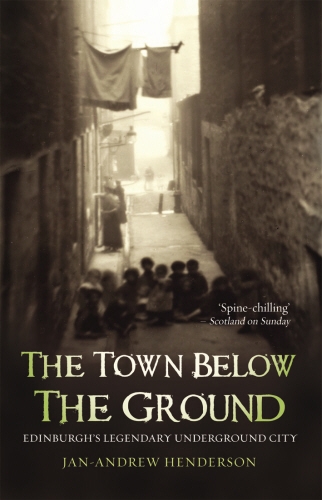 Book cover of The Town Below the Ground by Jan-Andrew Henderson
