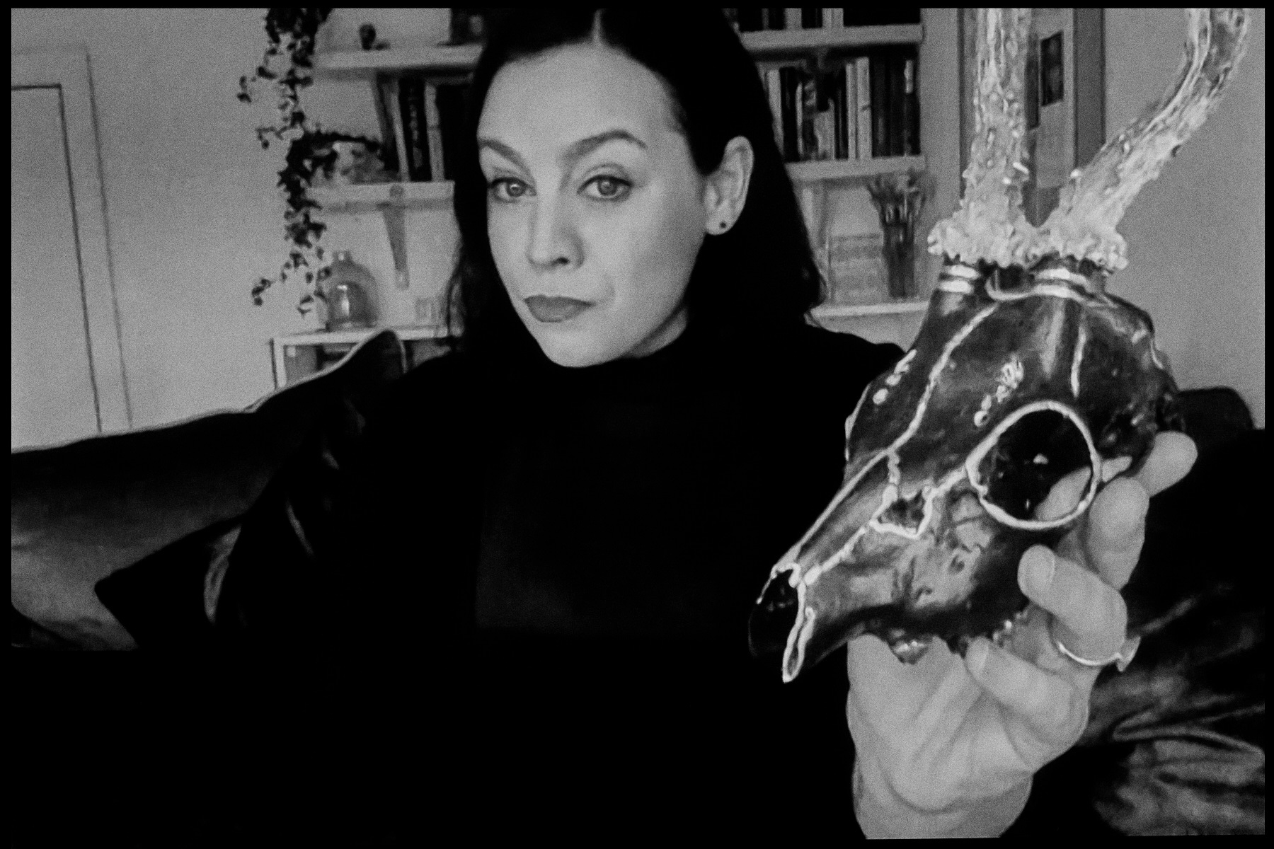 A portrait of Jenni Fagan with a horned skull 