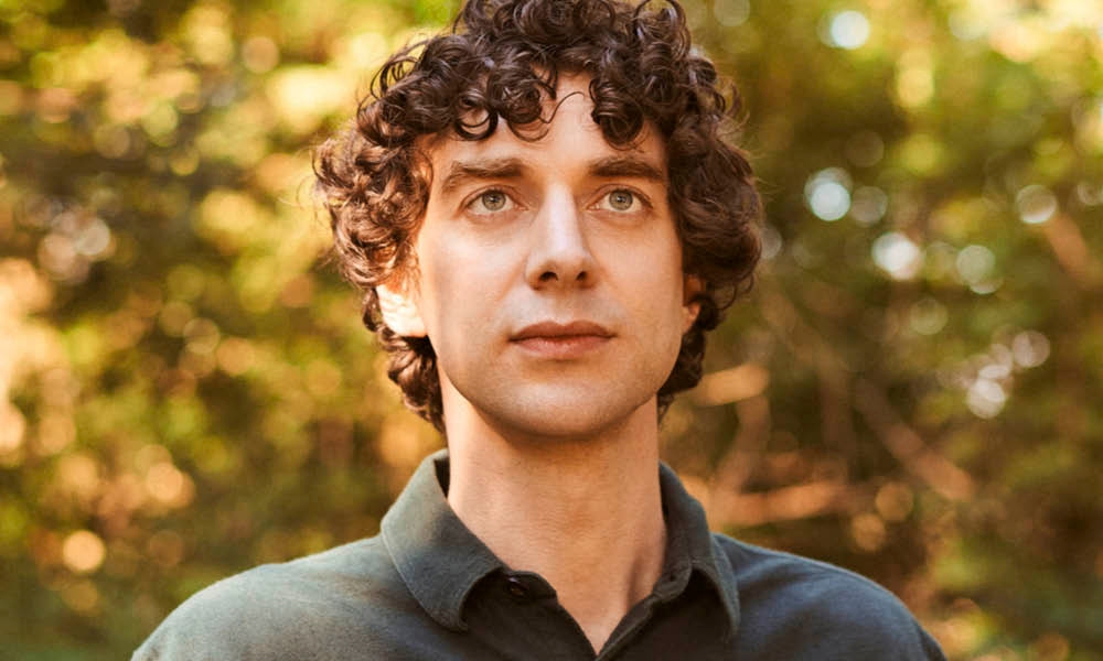 A photograph of Merlin Sheldrake next to the words 'Hidden Depths'