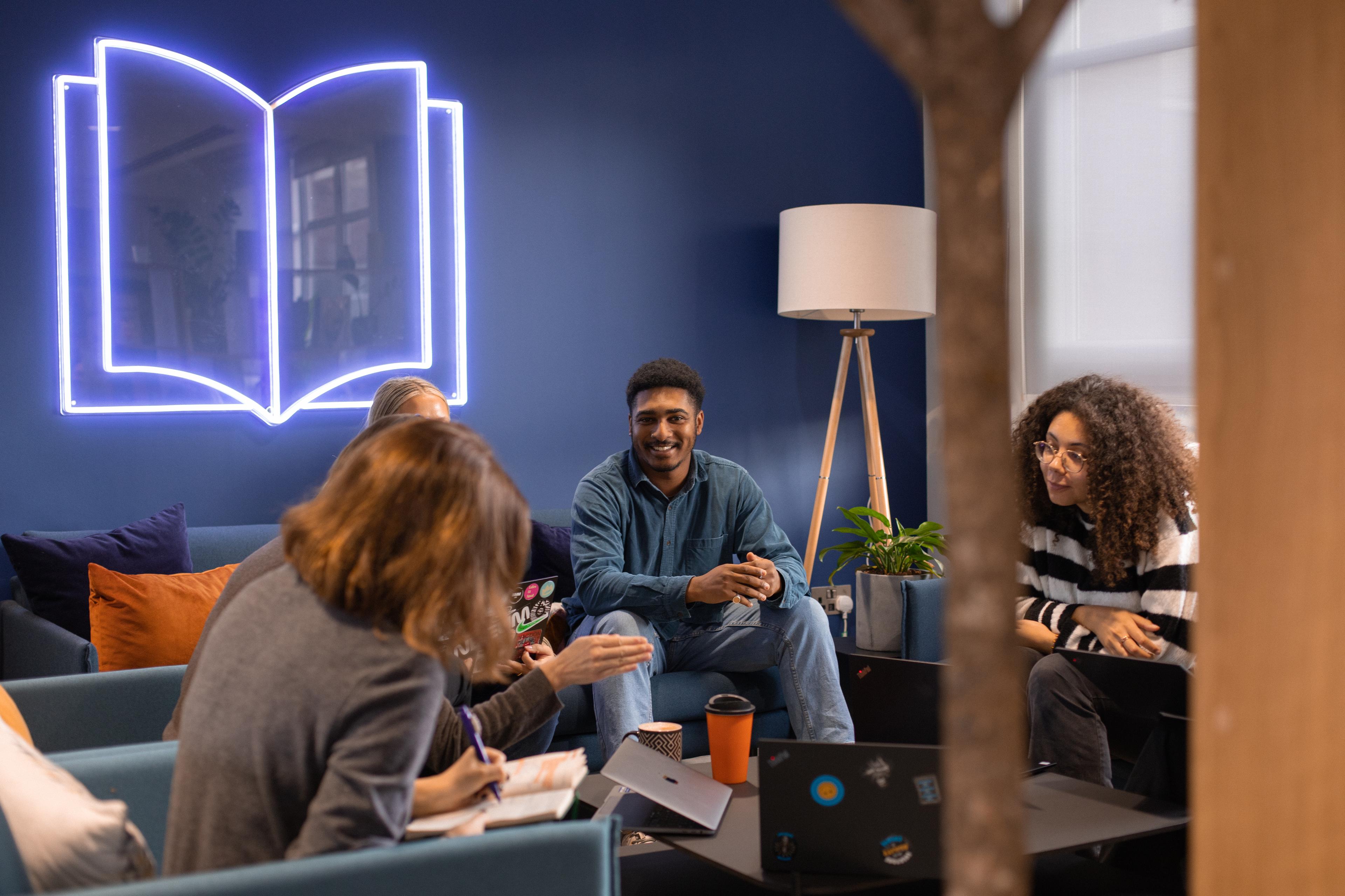 Photo of employees in the Penguin London office